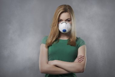 Young woman in air pollution concept clipart