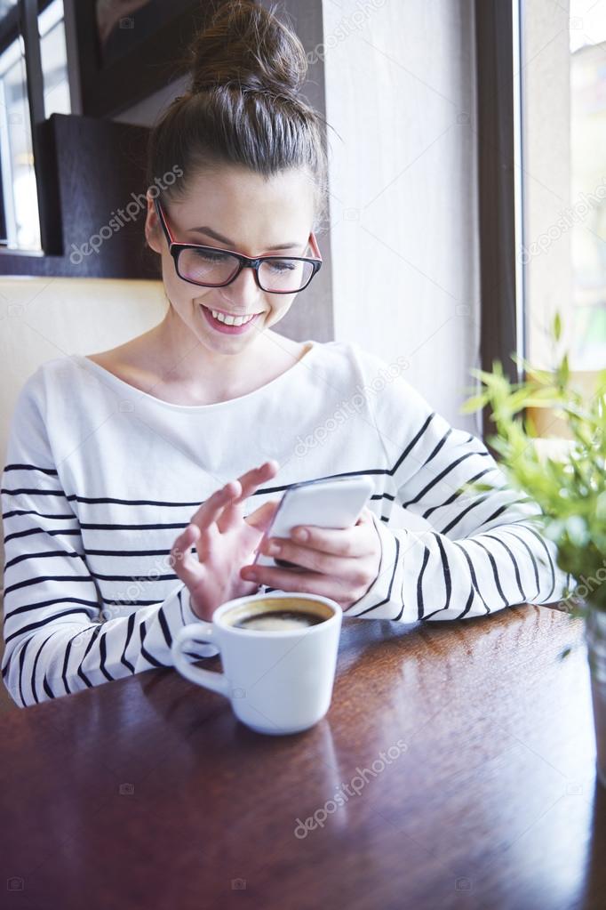 Young woman using cell phone