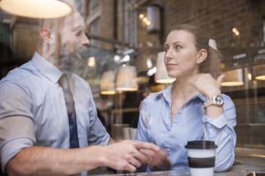 Successful business people in cafe