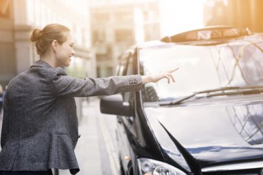 Successful businessman catching cab