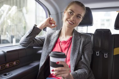 successful businesswoman with coffee
