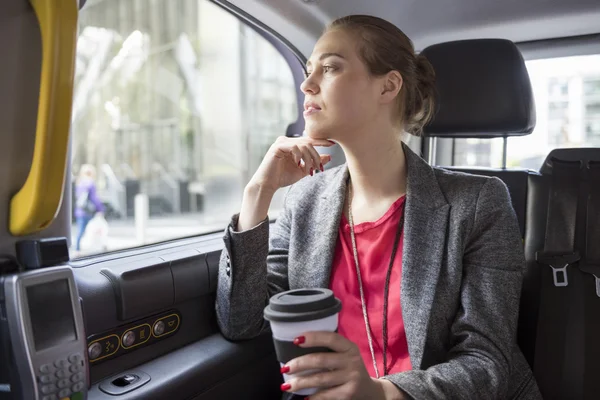 Successful businesswoman with coffee — Stock Photo, Image