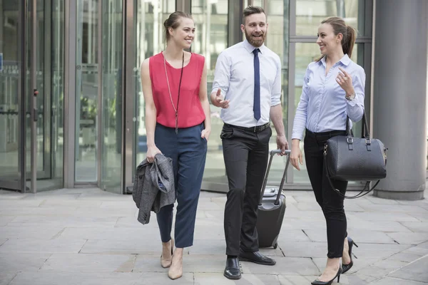Successful business people moving from hotel — Stock Photo, Image