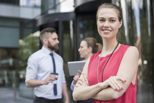 Successful business woman with colleagues — Stok fotoğraf