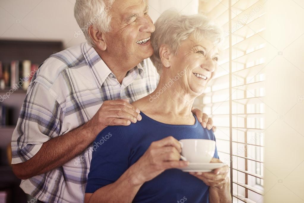 Happy mature couple hugging