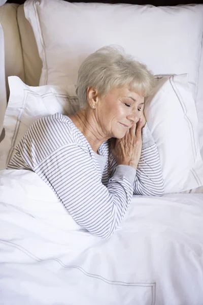 Mature woman sleeping — Stock Photo, Image