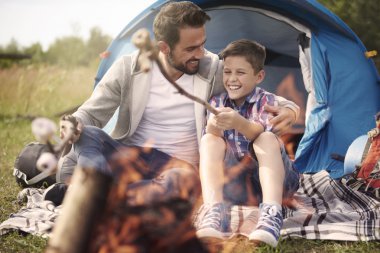 father with son camping
