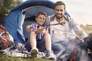 father with son camping
