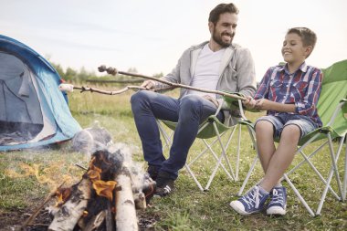 father with son camping