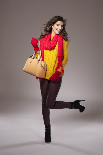 Girl wearing a warm autumnal outfit