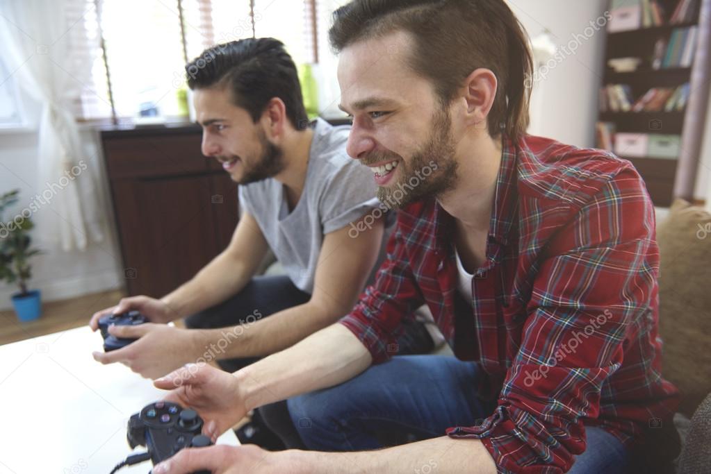 Men playing playstation
