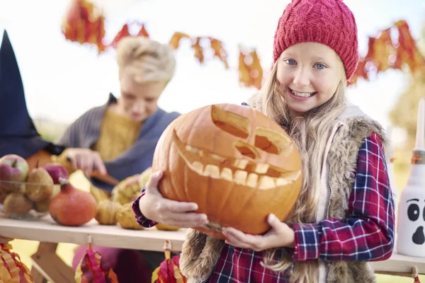 Girl with homemade pumpkin — Stock Photo, Image