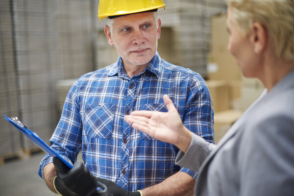 businesswoman and foreman working