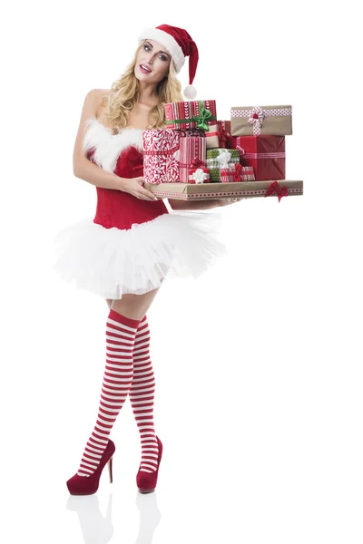 Santa Claus girl with pile of gift boxes — Stock Photo, Image