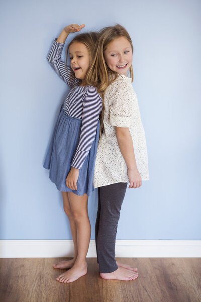 Girls checking who is taller