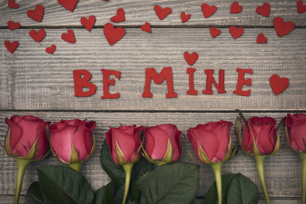 red roses and be mine text