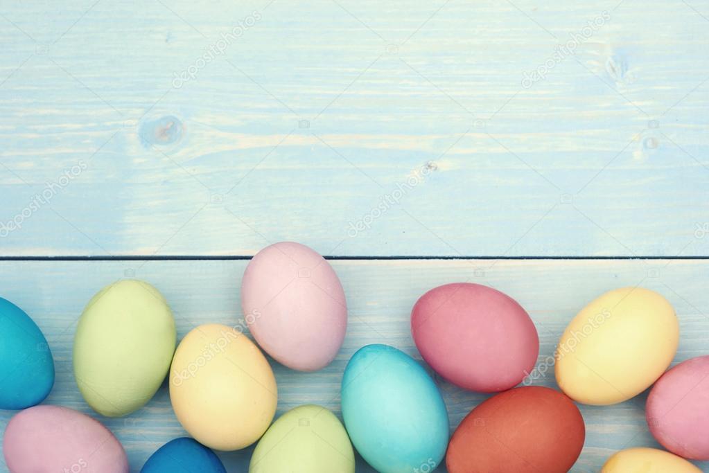 Easter eggs on wooden planks