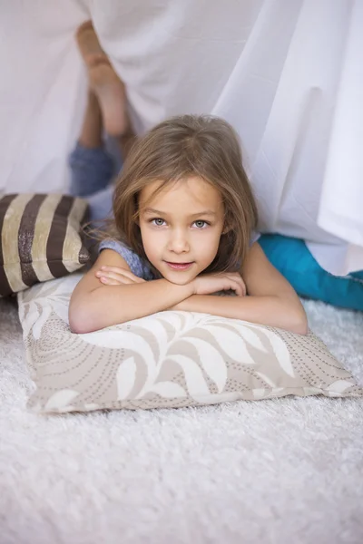 Child resting on comfortable pillow — Stock Photo, Image