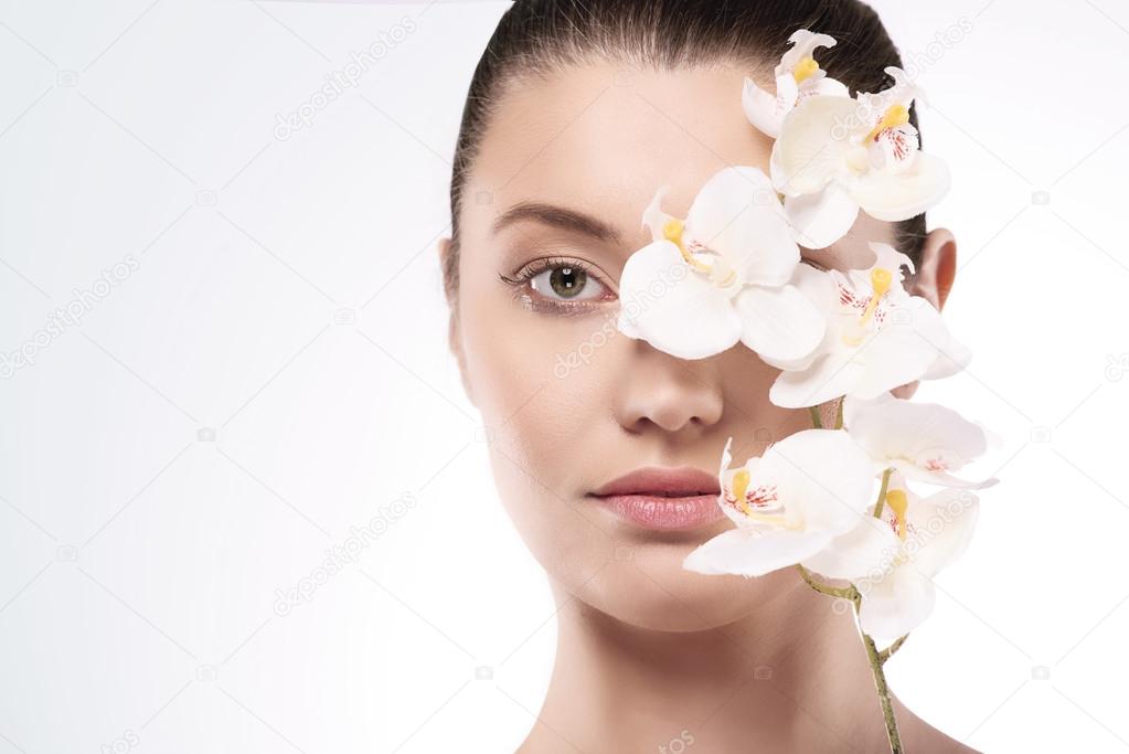 Beauty woman with pure flower