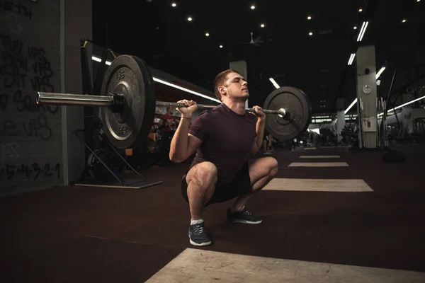 Young Muscular Male Athlete Squatting Heavy Barbell Cross Fit Gym — Stock Photo, Image