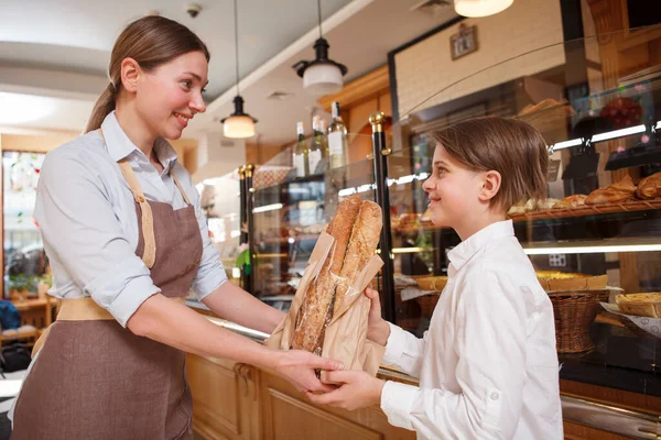 Cheerful Young Boy Buying Bread Friendly Female Baker Local Bread — Stock Photo, Image