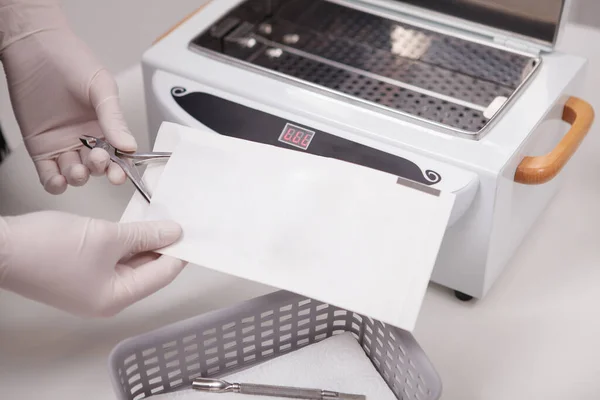 Close Hands Manicurist Preparing Instruments Dry Heat Sterilization — Stock Photo, Image