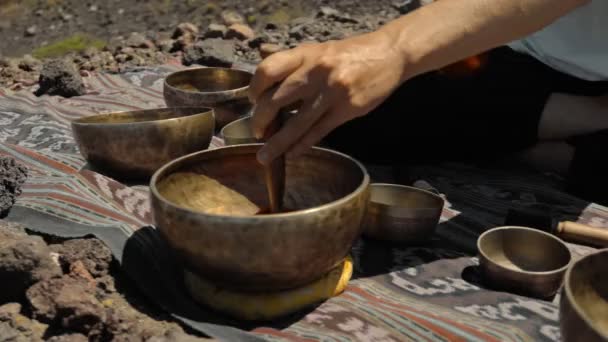 Young Asian Guy Playing Tibedt Singing Copper Cups Viewing Mountain — Stock Video