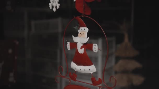 Small Red Christmas Toys Santa Claus Hanging Glass House — Stock Video