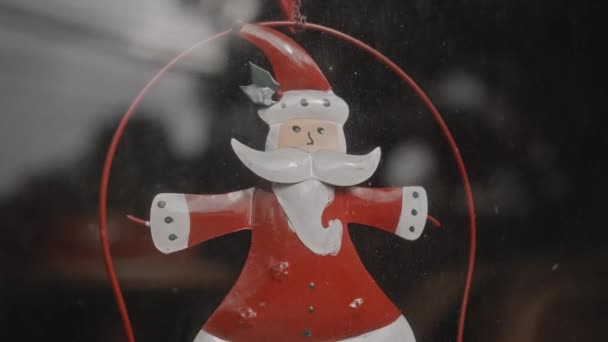 Small Red Christmas Toys Santa Claus Hanging Glass House — Stock Video