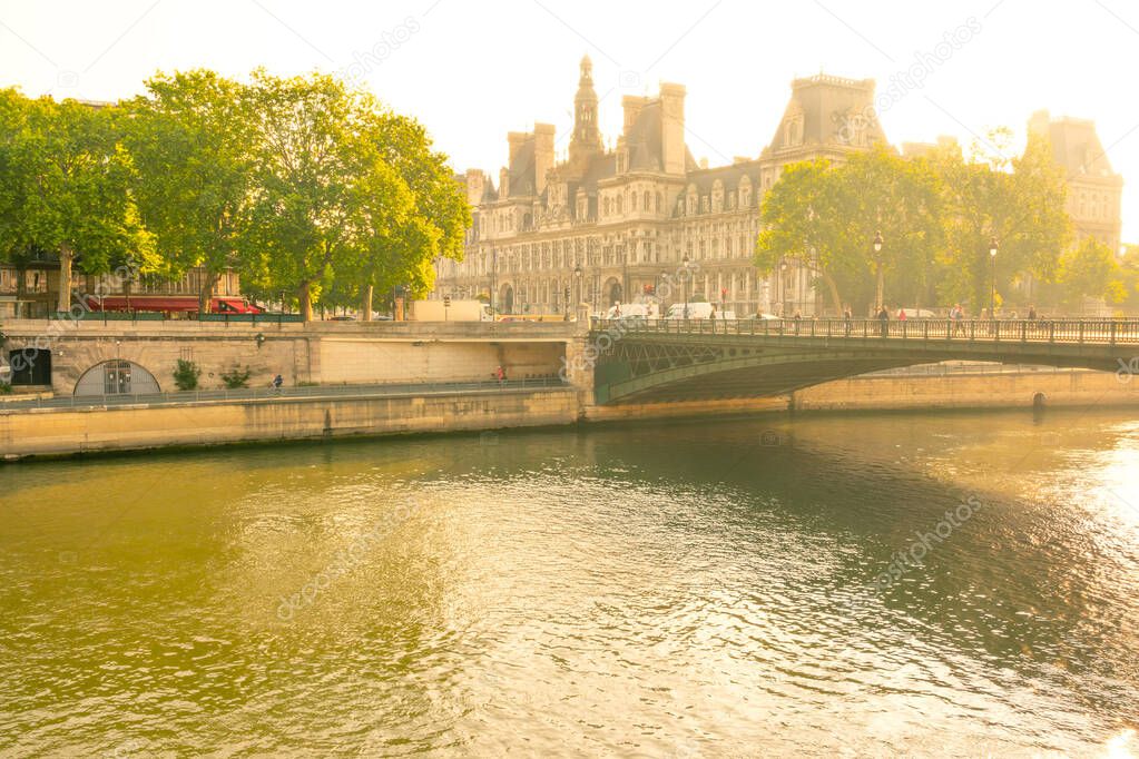 France. Sunny summer morning in Paris on the River Seine overlooking the Hotel De Ville