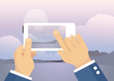 Adam cep telefonu - Göl Manzaralı ile manzara fotoğrafı çekmek