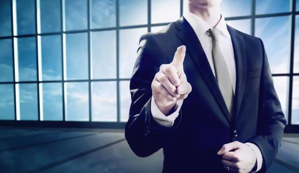 Business man pointing towards camera — Stock Photo, Image