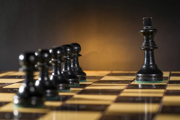 Sommige houten schaakstukken — Stockfoto