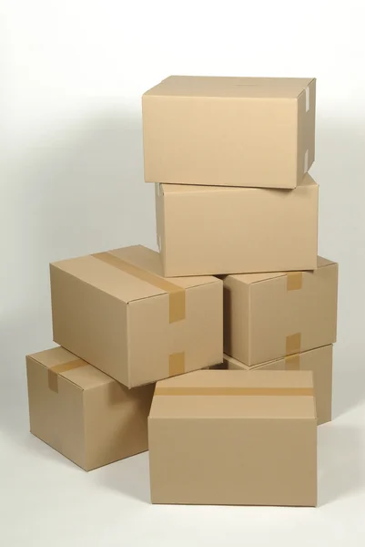 Pile of cardboard box on white background Royalty Free Stock Images