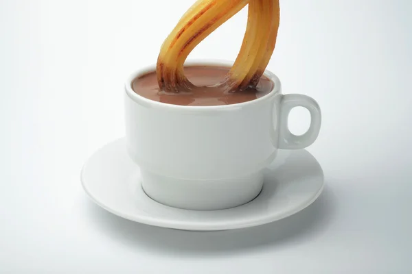 Chocolate quente com churro — Fotografia de Stock