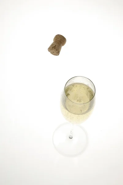 Copa de champán y corcho — Foto de Stock
