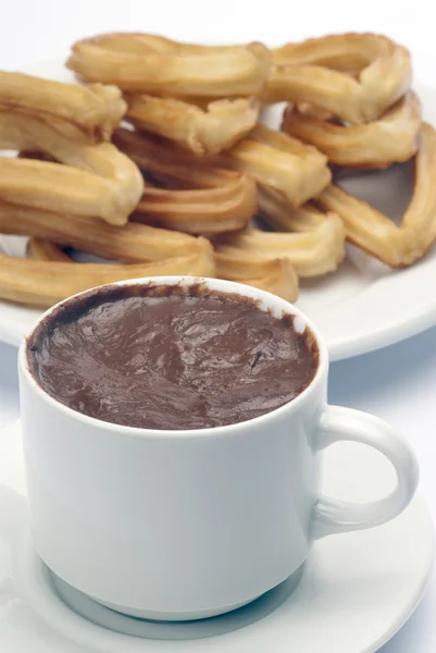 Chocolate quente com churros — Fotografia de Stock