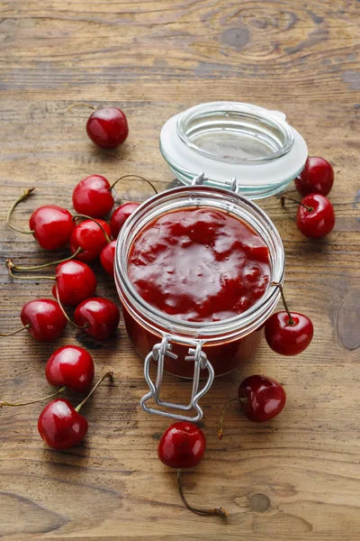 Jar of cherry jam — Stock Photo, Image