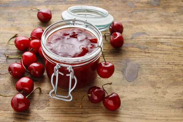 Jar of cherry jam — Stock Photo, Image