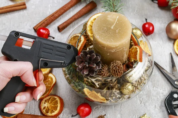 Woman making traditional christmas decorations — Stock Photo, Image