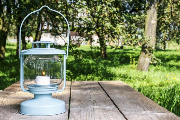 Iron lantern in the garden — Stock Photo, Image