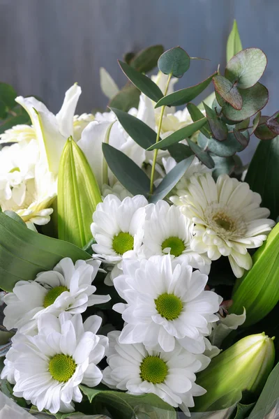 White gerbera flowers, chrysanthemums and lilies. — Stock Photo, Image