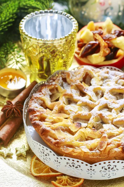 Apple pie and stuffed apples on christmas table — Stock Photo, Image