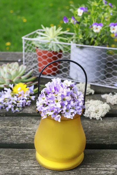 Bouquet of flowers in yellow vase. — Stock Photo, Image