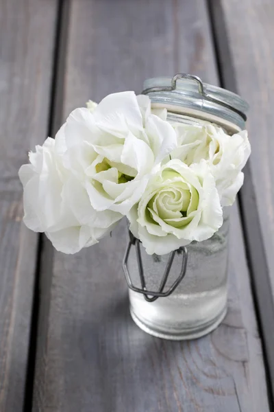 Tiny bouquet of white eustoma flowers — Stock Photo, Image