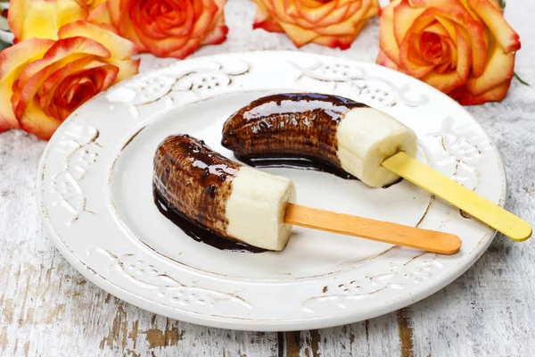 Bananas with chocolate — Stock Photo, Image