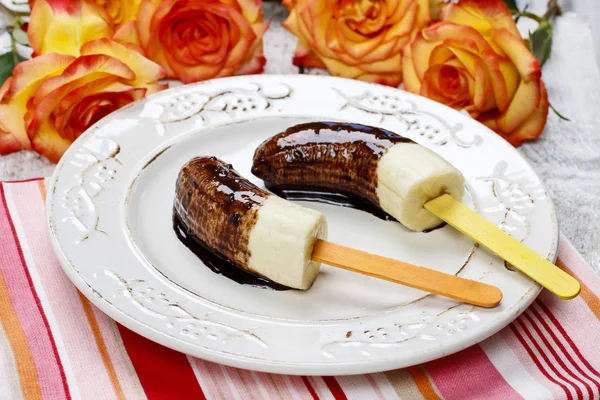 Bananas with chocolate — Stock Photo, Image