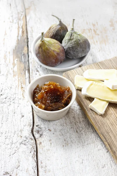 Bowl of fig jam and raw figs — Stock Photo, Image