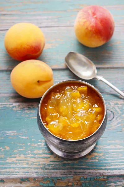 Vintage silver goblet of peach jam — Stock Photo, Image