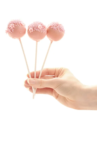 Pink and yellow cake pops isolated on white background — Stock Photo, Image
